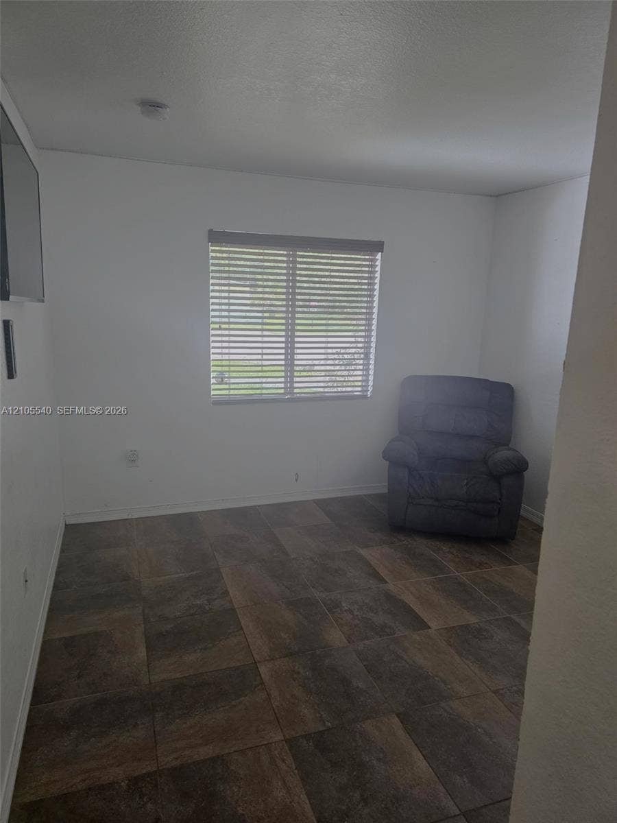 21935 SW 102nd Avenue, Cutler Bay, FL 33190 Wood-look tile flooring throughout