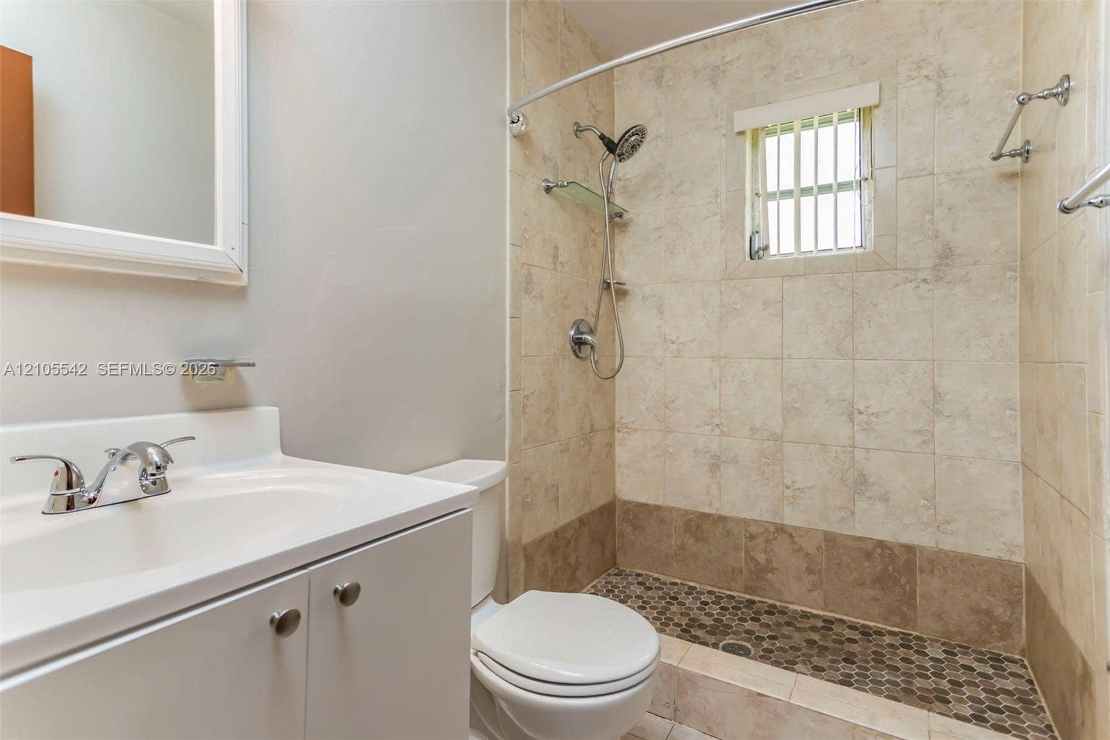 Vanity with integrated sink and chrome faucet