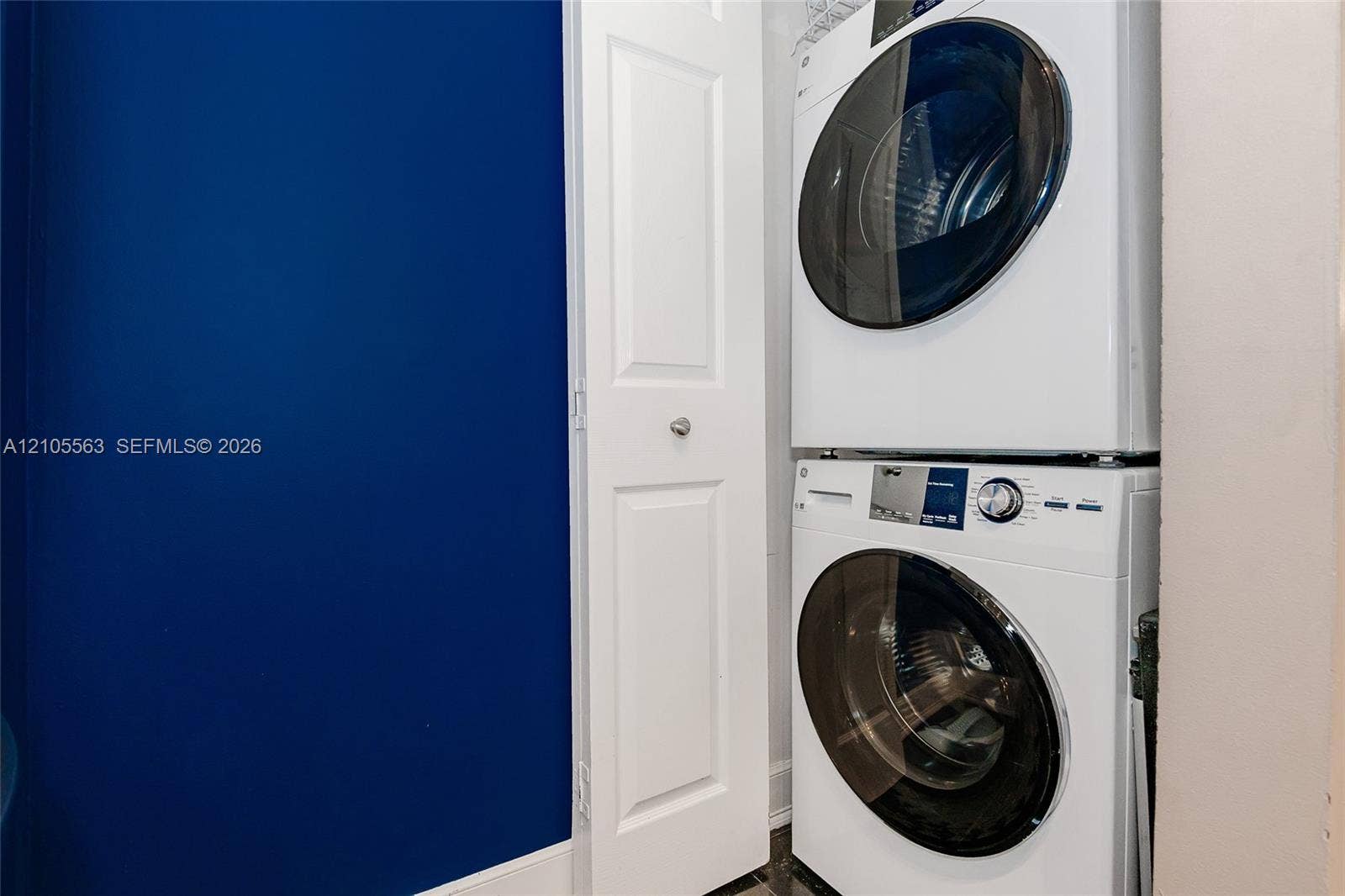 17145 N Bay Road, #4613, Sunny Isles Beach, Sunny Isles Beach, FL 33160 Stacked laundry appliances within a dedicated utility area