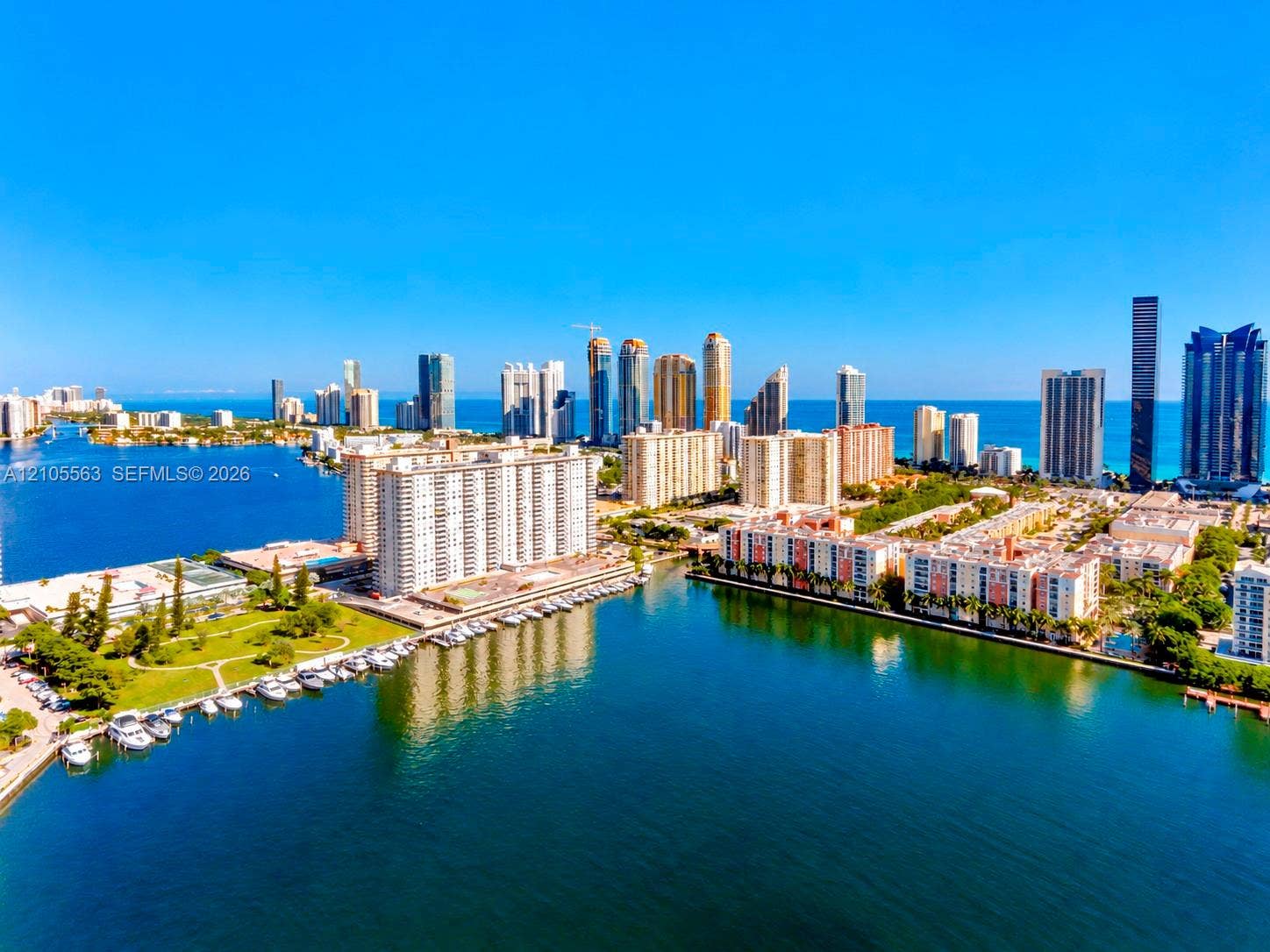 17145 N Bay Road, #4613, Sunny Isles Beach, Sunny Isles Beach, FL 33160 Waterfront property featuring marina access, a city skyline, and ocean proximity