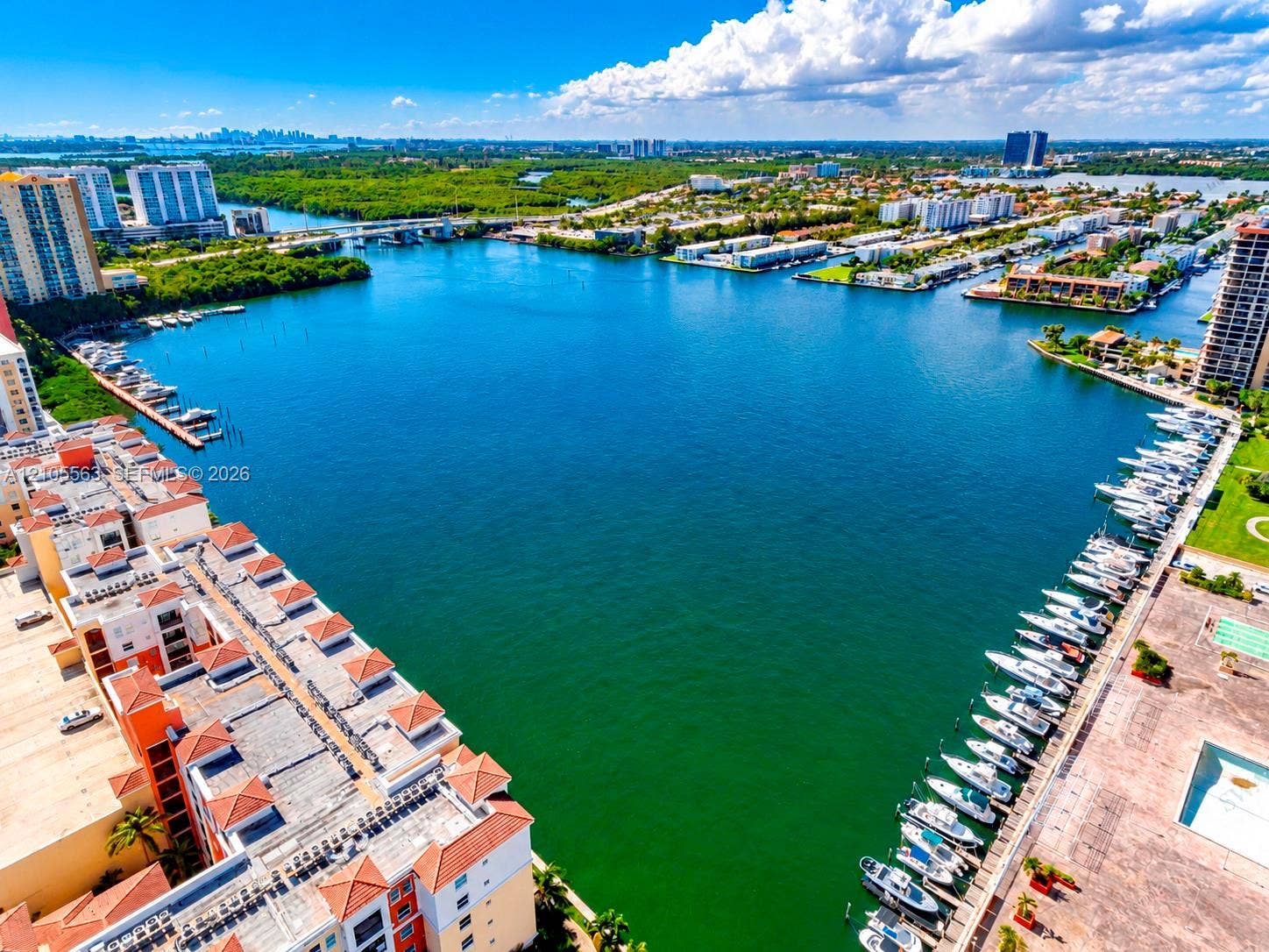 17145 N Bay Road, #4613, Sunny Isles Beach, Sunny Isles Beach, FL 33160 Waterfront setting with marina, urban skyline, and surrounding residential buildings