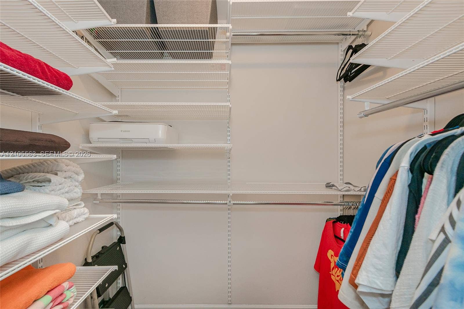 17145 N Bay Road, #4613, Sunny Isles Beach, Sunny Isles Beach, FL 33160 Built-in wire shelving system with multiple storage levels and hanging rods