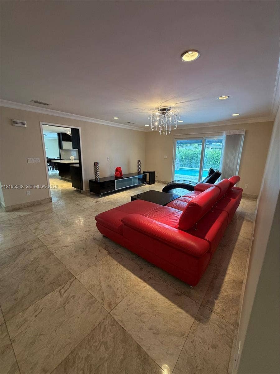 2215 NE 204th Street, Miami, Miami, FL 33180 Recessed lighting, crown molding, and large format tile flooring