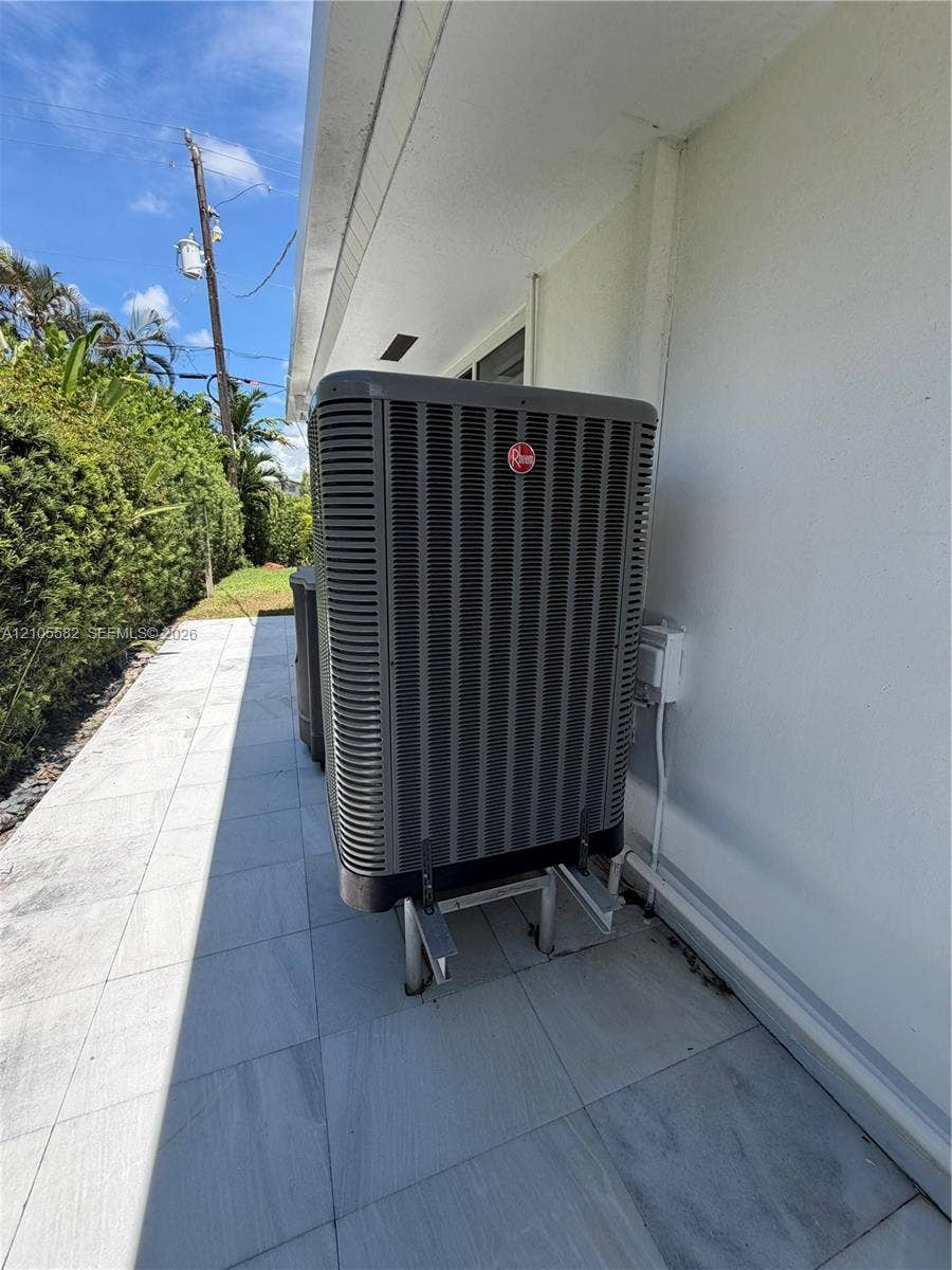 2215 NE 204th Street, Miami, Miami, FL 33180 Exterior white stucco wall