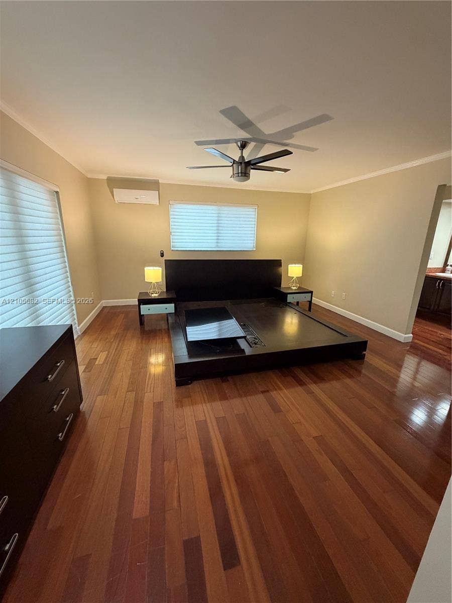 2215 NE 204th Street, Miami, Miami, FL 33180 Rich wood-finish flooring with a neutral wall palette