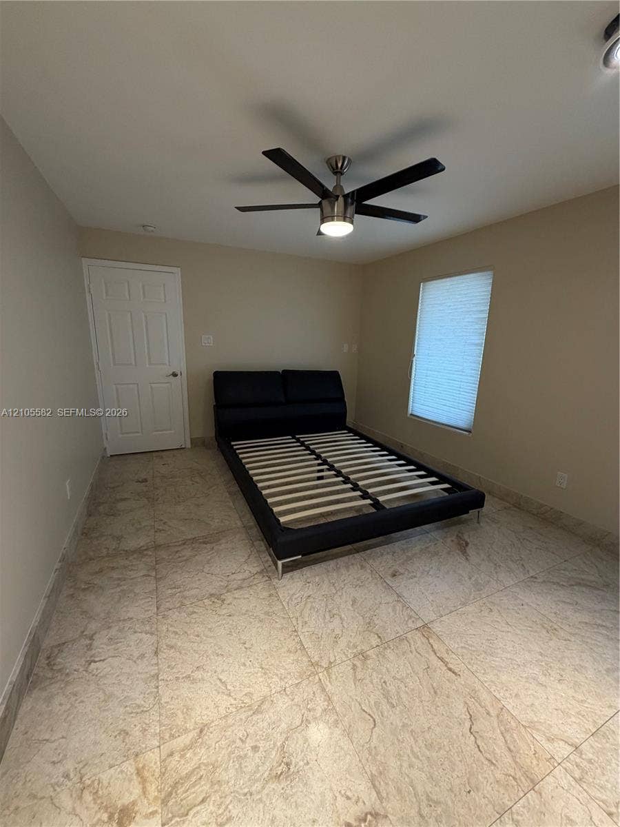 2215 NE 204th Street, Miami, Miami, FL 33180 Recessed lighting, ceiling fan with integrated lighting, tiled flooring, window with blinds