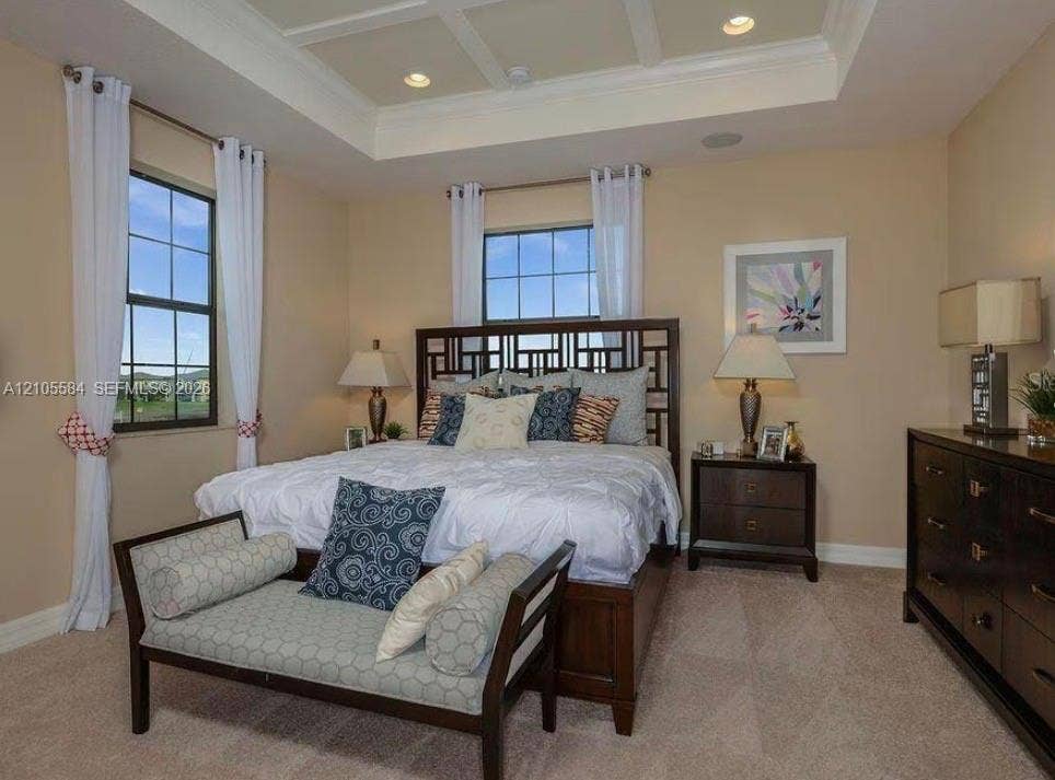10197 Eagle Creek Center Boulevard, Orlando, FL 32832 Tray ceiling with recessed lighting and multi-pane windows