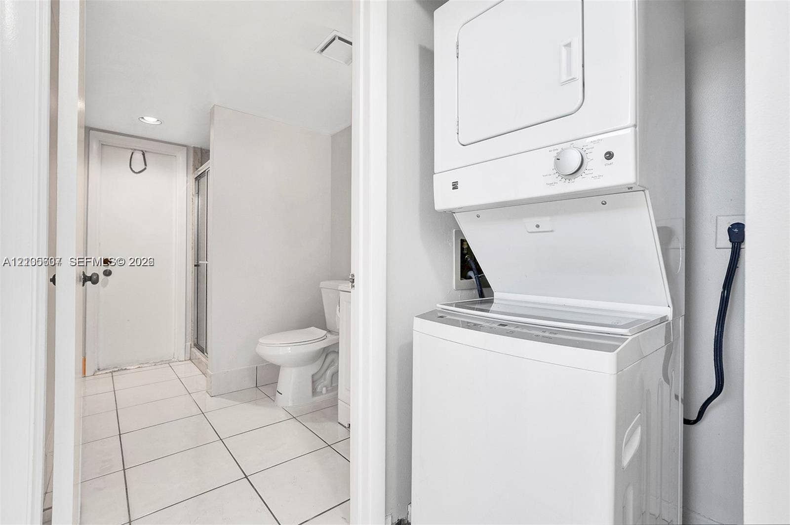 9892 Boca Gardens Parkway, #A, Boca Raton, FL 33496 White stacked washer and dryer unit
