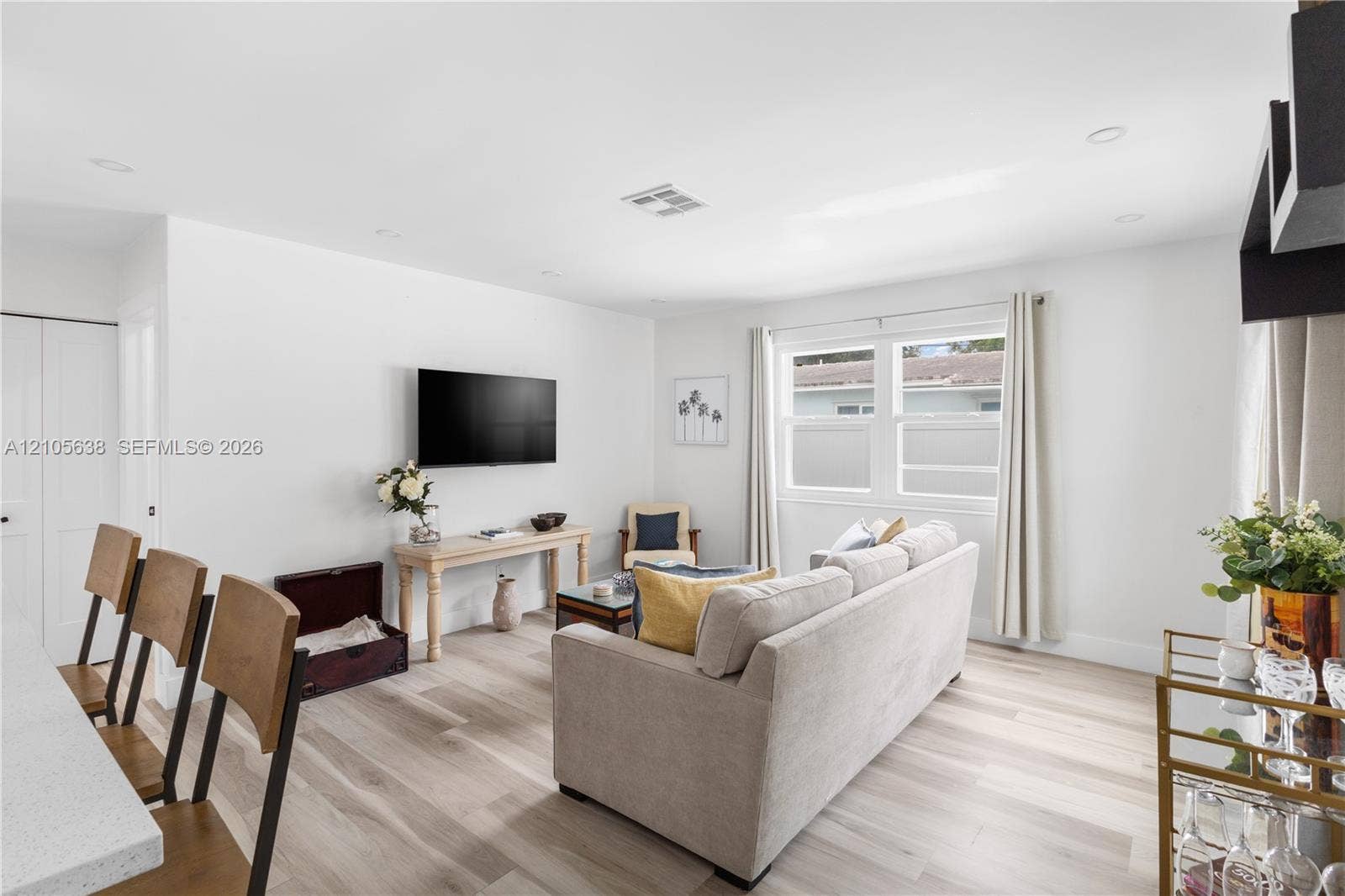 1429 NW 10th Street, #1, Dania, Dania Beach, FL 33004 Open-concept interior featuring light wood-finish flooring, recessed lighting, and dual-pane windows