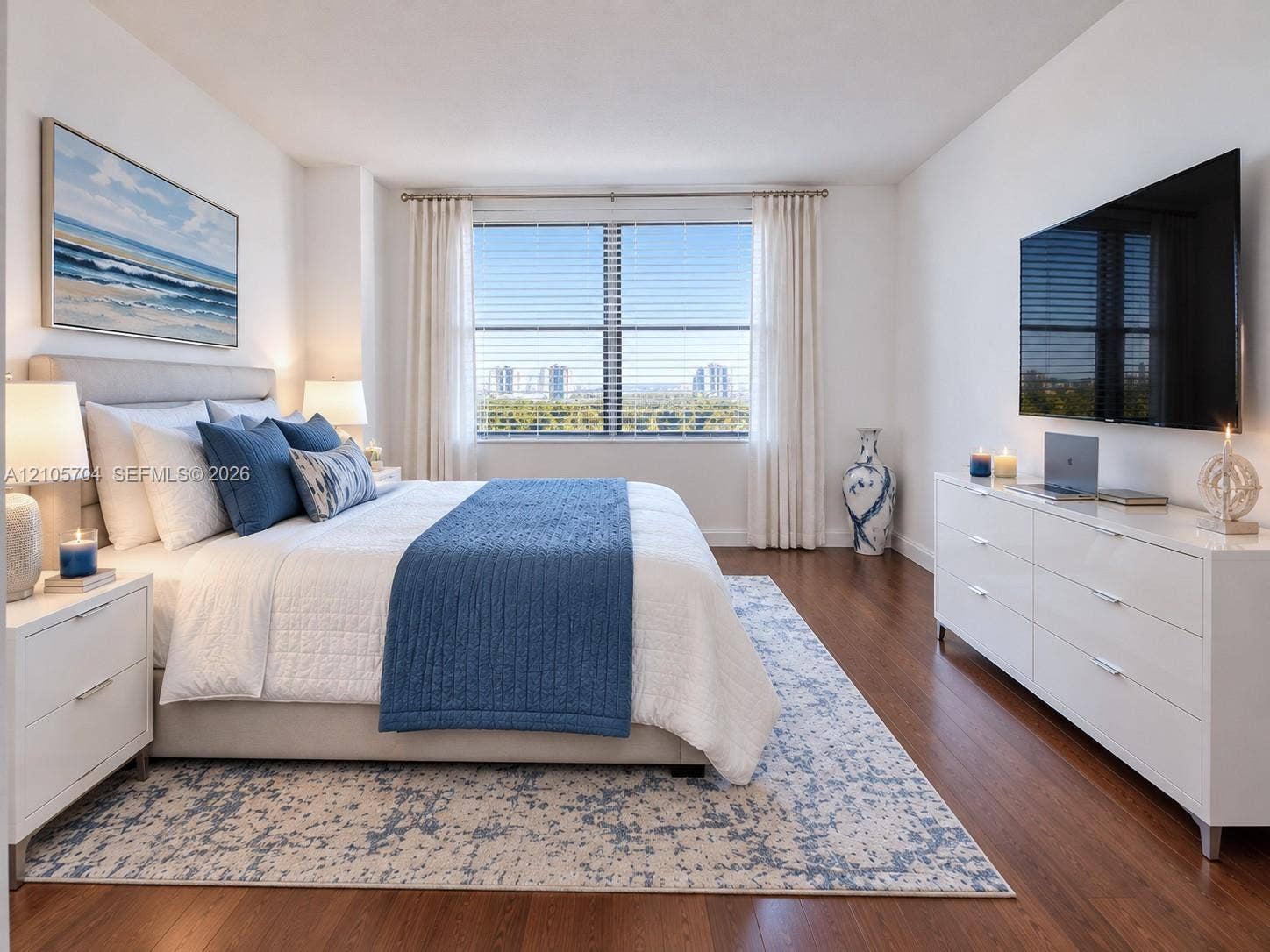 251 174th Street, #212, Sunny Isles Beach, Sunny Isles Beach, FL 33160 Full-height natural stone tile surround, integrated built-in corner shelf, white porcelain bathtub, and metallic shower hardware