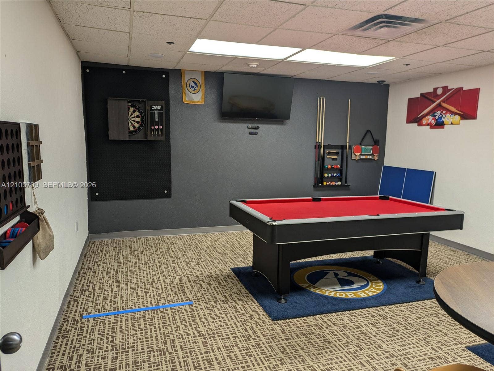 300 Three Islands Boulevard, #516, Hallandale Beach, FL 33009 Finished flex space featuring a patterned carpet floor, neutral wall paint, and a drop ceiling with recessed lighting