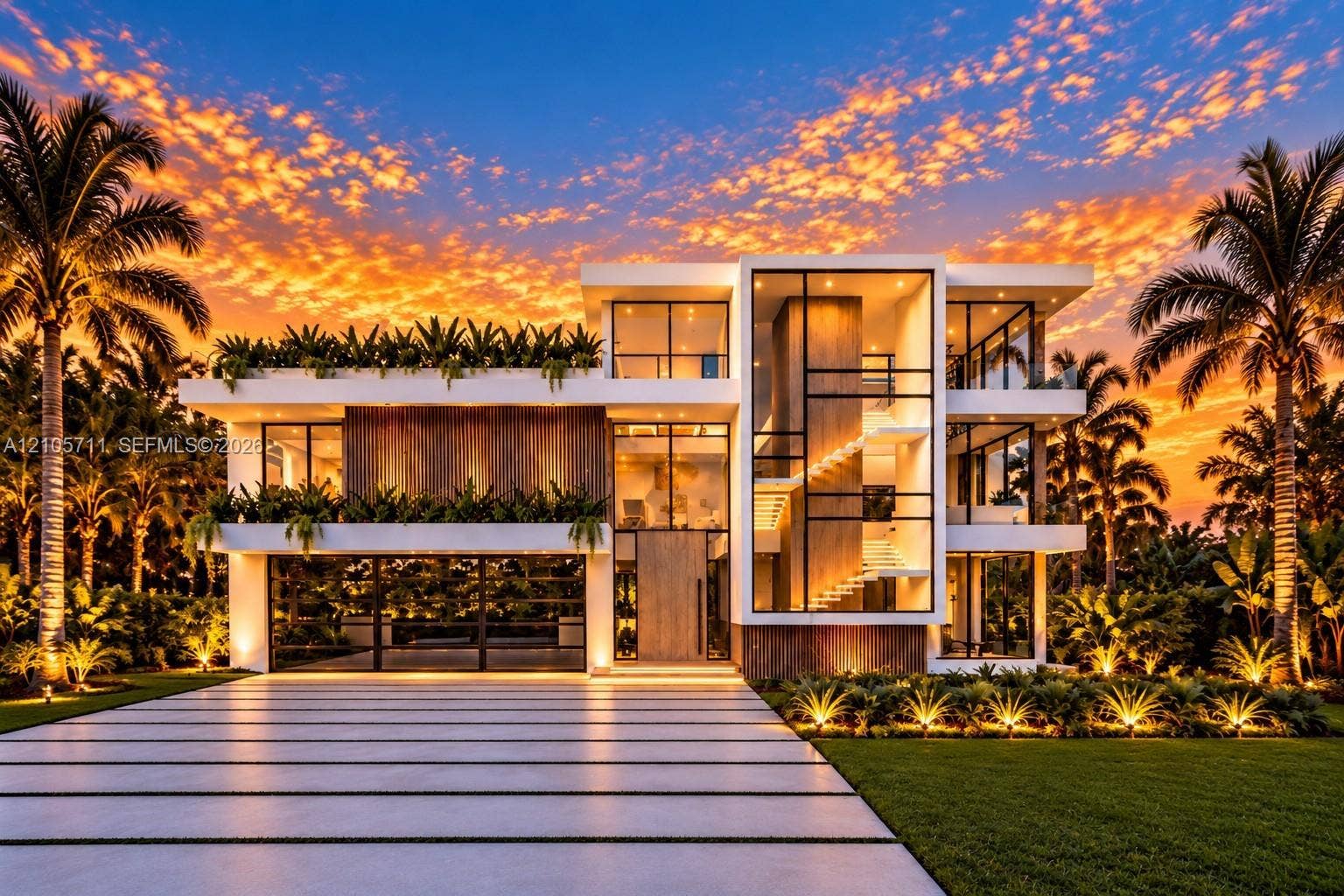 839 Orchid Drive, Boca Raton, FL 33432 Three-story modern architectural exterior featuring floor-to-ceiling glass paneling, integrated wood-finish cladding, extensive second-level terrace planters, and a multi-car garage with glass-paneled doors