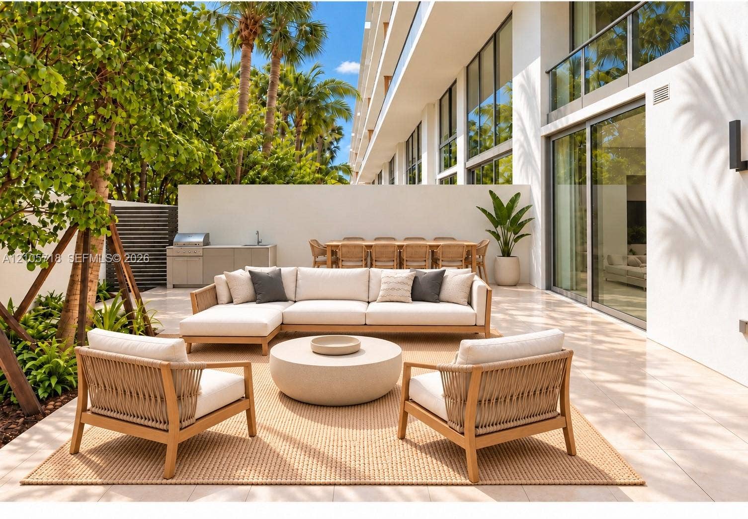 2200 Brickell Avenue, #GV16, Miami, FL 33129 Private terrace featuring large-format tile flooring, built-in outdoor kitchen with stainless steel grill, expansive floor-to-ceiling glass sliding doors, and surrounding perimeter walls