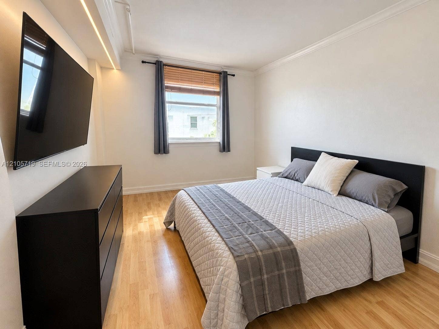 1 Glen Royal Parkway, #1510, Miami, FL 33125 Wood-finish flooring, crown molding, and recessed ceiling lighting