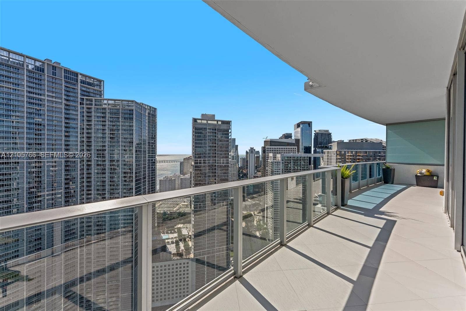 200 Biscayne Boulevard Way, #4408, Miami, FL 33131 Private terrace with glass railing, facing Brickell Avenue, the skyline and the bay.