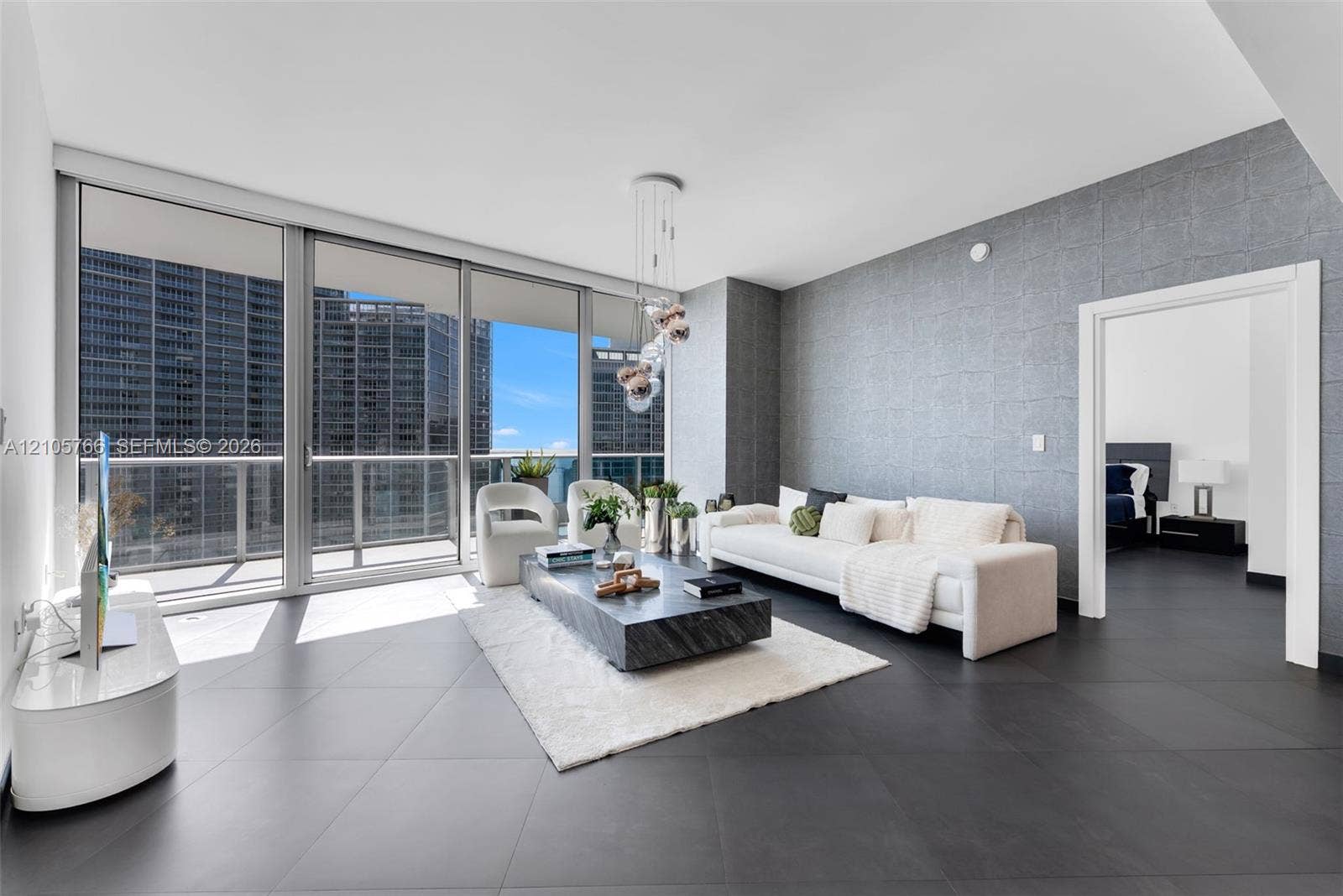 200 Biscayne Boulevard Way, #4408, Miami, FL 33131 Living room seating beside the sliding glass doors to the terrace.