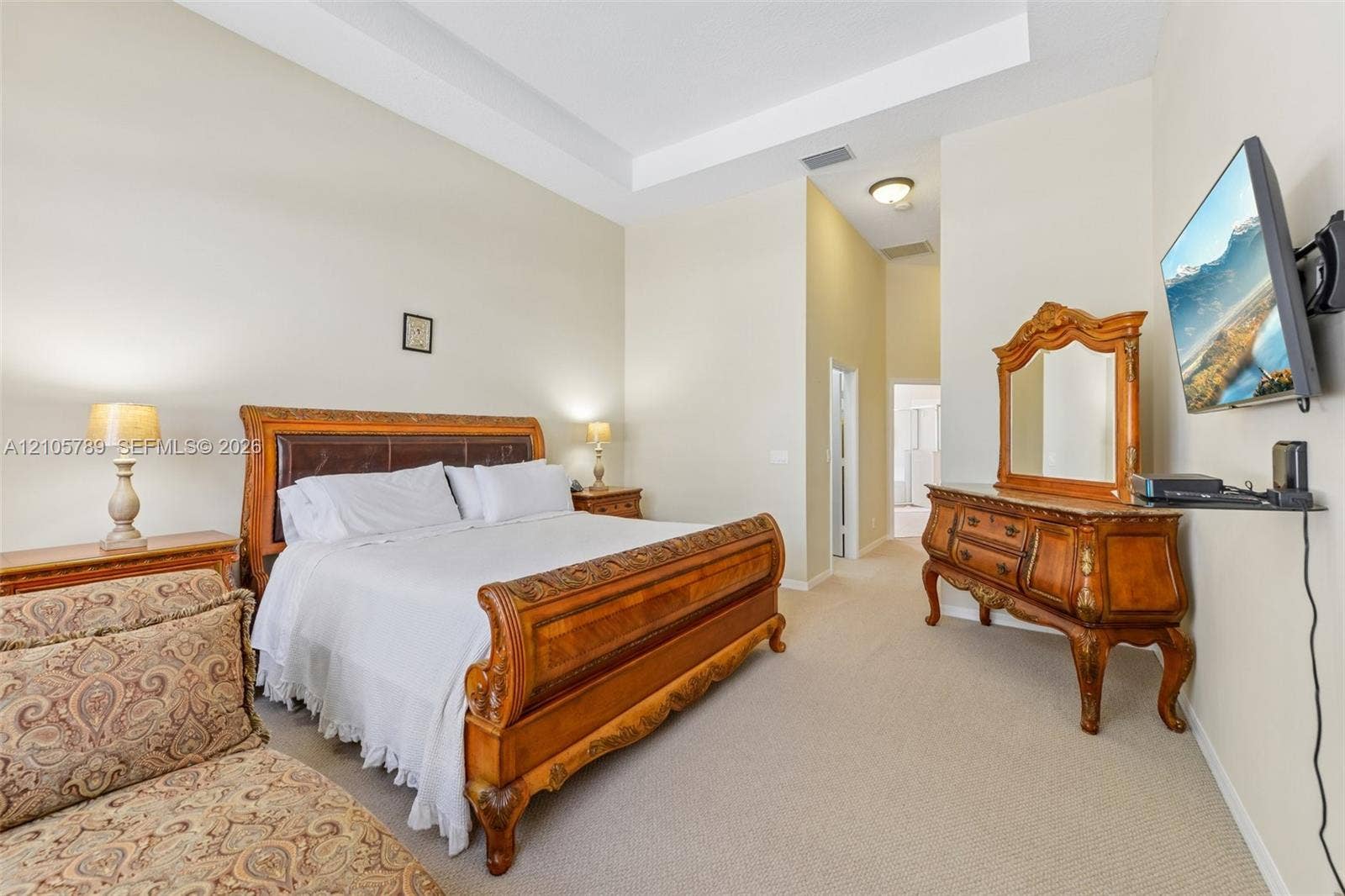 6353 SW 191st Avenue, Pembroke Pines, FL 33332 Room featuring high ceilings with crown molding, recessed lighting, and neutral carpeted flooring