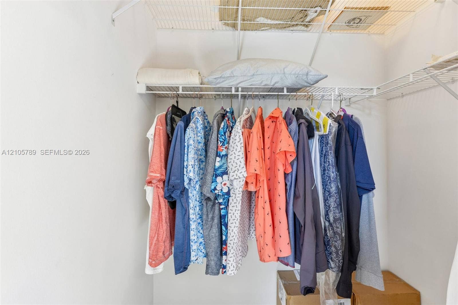 6353 SW 191st Avenue, Pembroke Pines, FL 33332 Closet featuring white wire shelving and a horizontal rod for garment storage