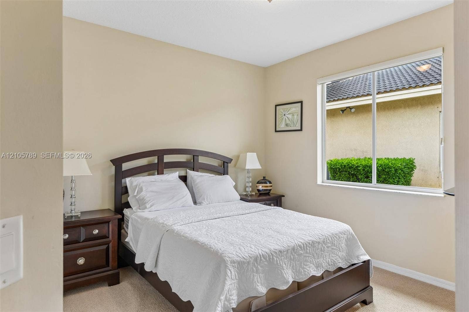 6353 SW 191st Avenue, Pembroke Pines, FL 33332 Neutral-toned interior featuring carpeting and a large slider window