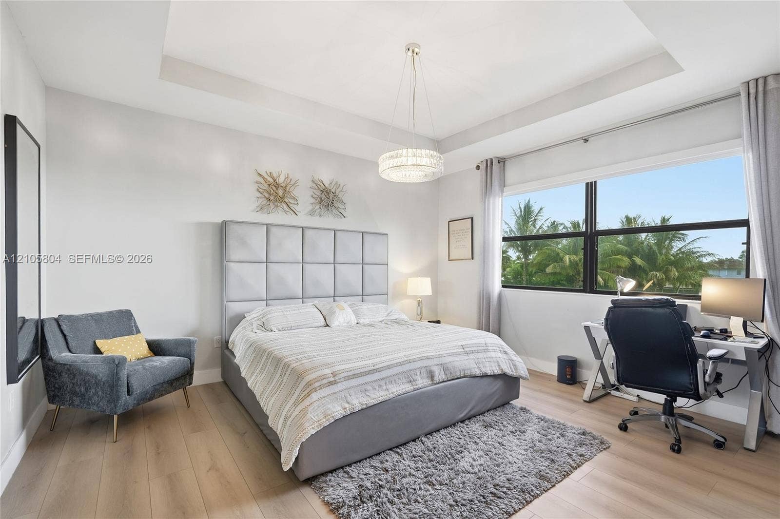 15932 SW 136th Way, Miami, FL 33196 Tray ceiling with recessed lighting, wood-finish flooring, and expansive windows