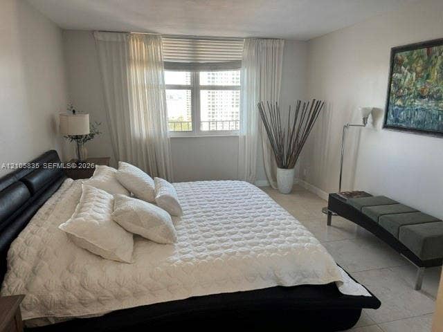 1400 S Ocean Drive, #1503, Hollywood, Hollywood, FL 33019 Large window featuring natural light, neutral walls, and light-toned tile flooring
