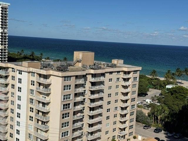 1400 S Ocean Drive, #1503, Hollywood, Hollywood, FL 33019 High-rise building featuring private balconies, stucco exterior, and oceanfront positioning