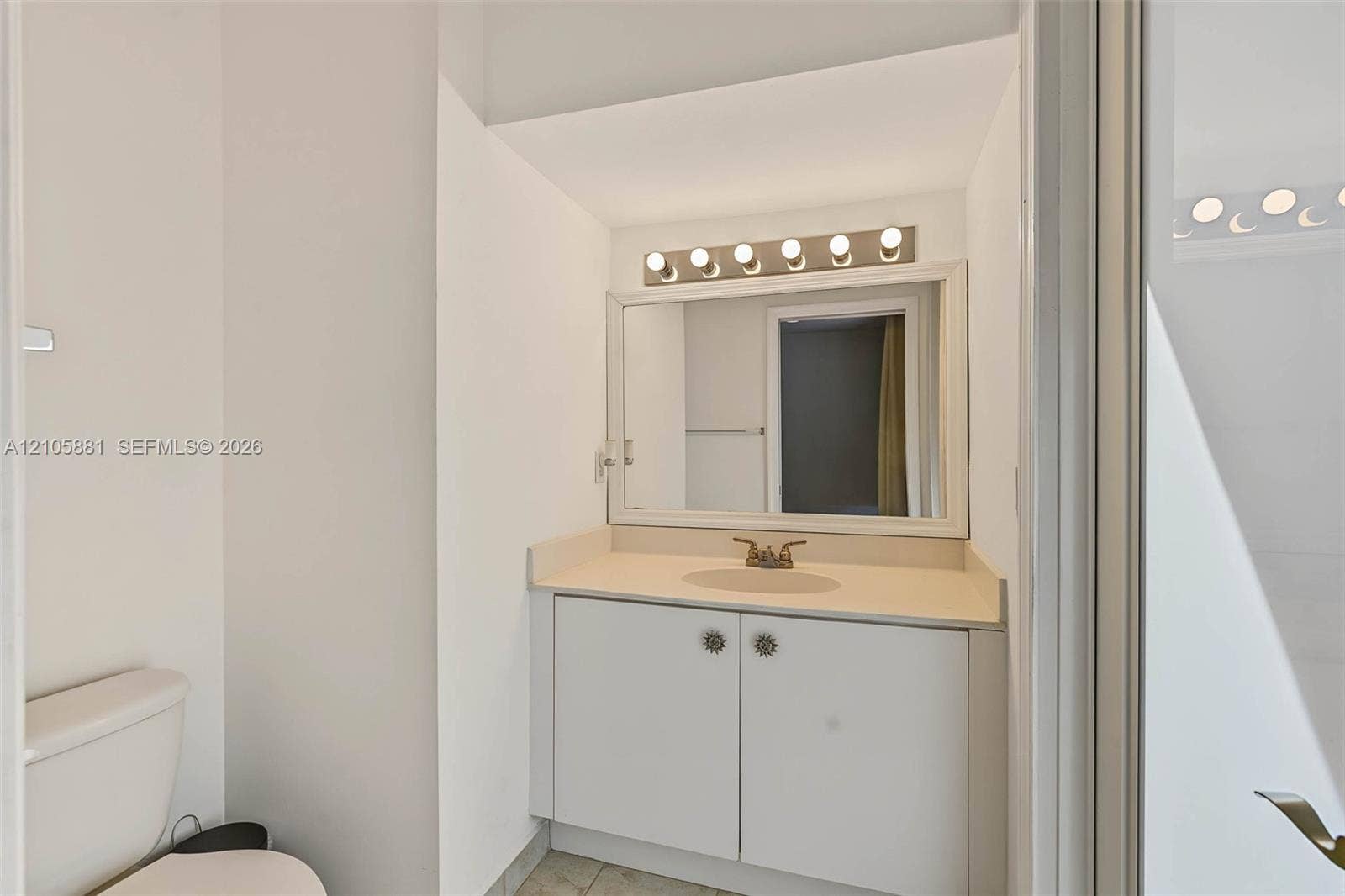 1588 SW 191st Avenue, Pembroke Pines, FL 33029 half bathroom downstairs
