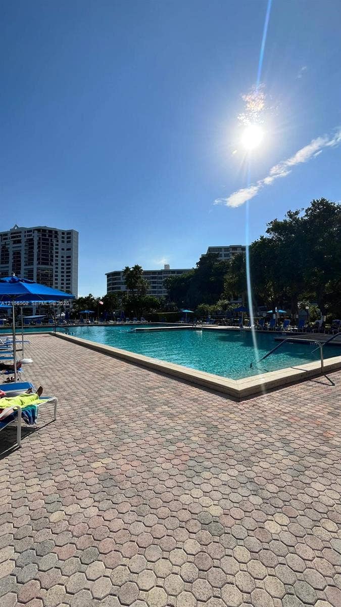600 Three Islands Boulevard, #913, Hallandale Beach, Hallandale Beach, FL 33009 In-ground swimming pool with a concrete apron and paver-stone decking