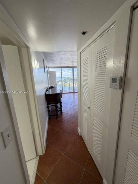 7601 E Treasure Drive, #2417, North Bay Village, North Bay Village, FL 33141 Tile flooring throughout and floor-to-ceiling glass sliding doors