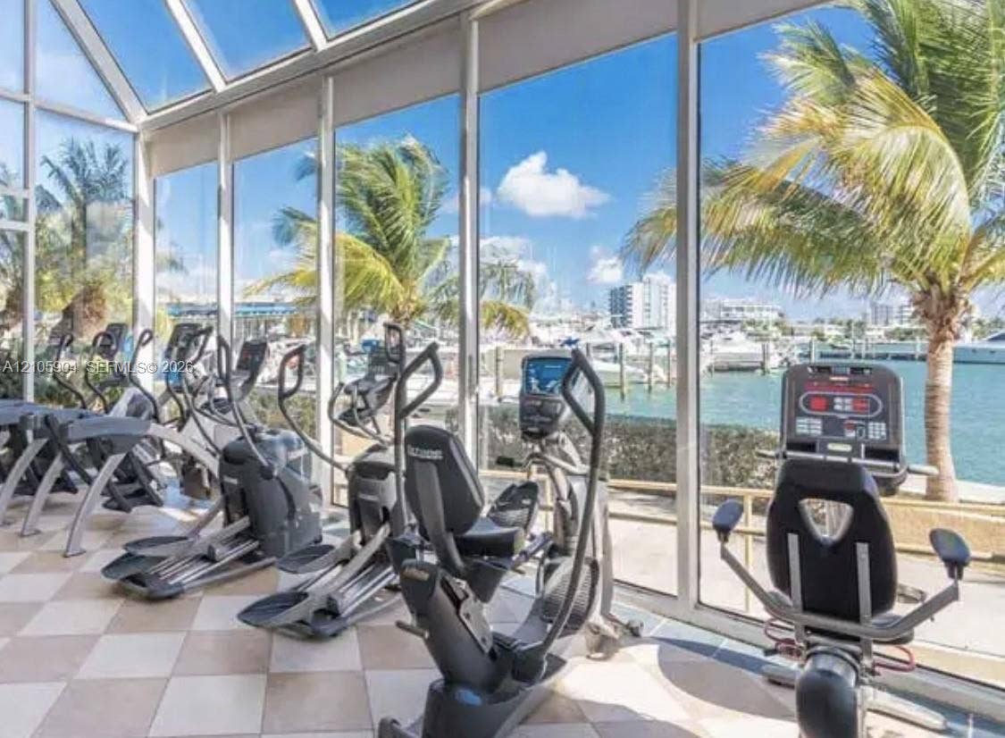 7601 E Treasure Drive, #2417, North Bay Village, North Bay Village, FL 33141 Floor-to-ceiling glass walls, expansive skylights, tile flooring, and direct maritime proximity