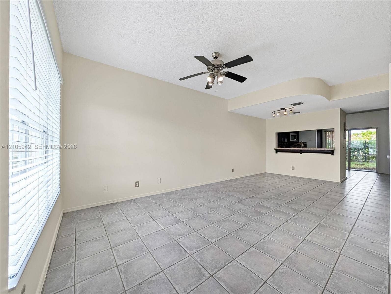 271 Duval Court, Weston, Weston, FL 33326 living ceramic floor tile, vaulted ceilings, a ceiling fan with integrated lighting