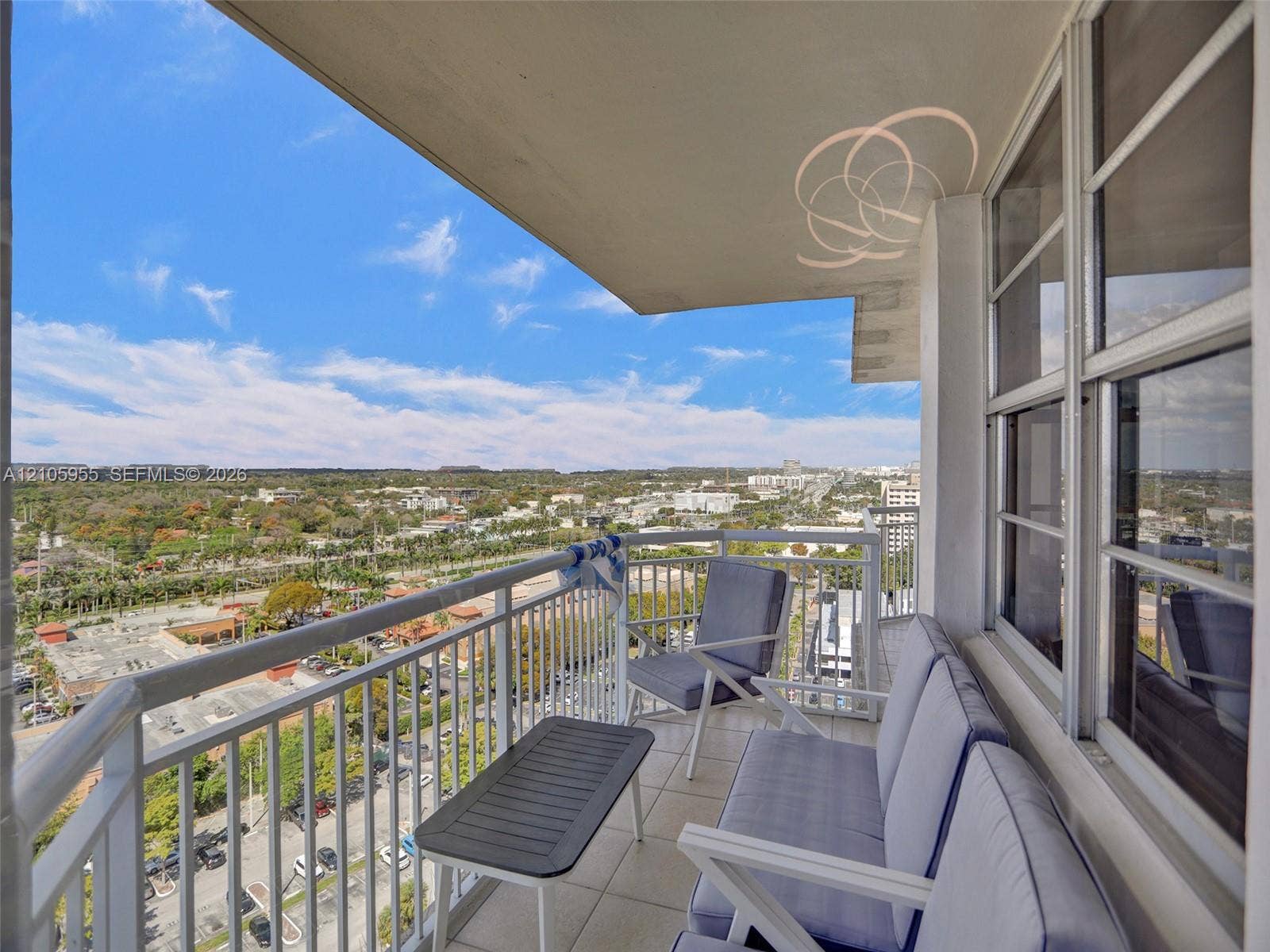 18011 Biscayne Boulevard, #1904, Aventura, FL 33160 Covered balcony featuring white metal railings and tile flooring