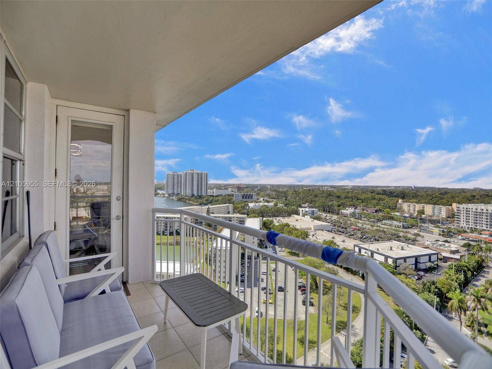 18011 Biscayne Boulevard, #1904, Aventura, FL 33160 Covered balcony featuring tile flooring and white metal railing
