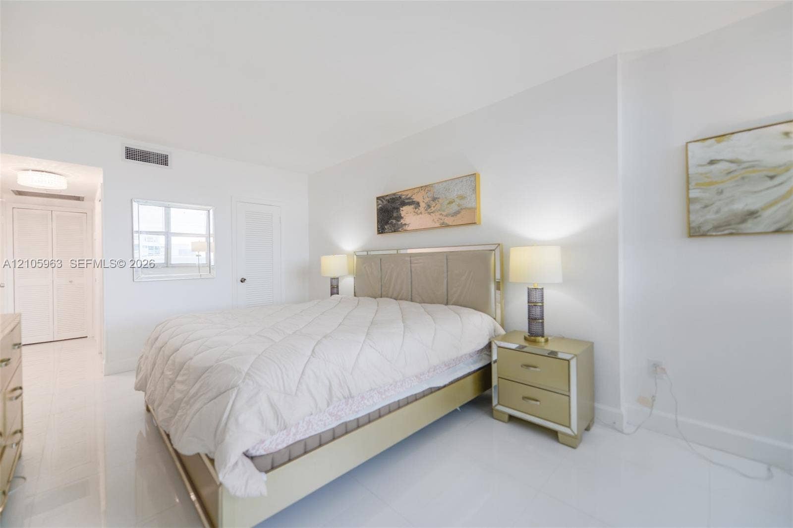 1980 S Ocean Drive, #PHA, Hallandale Beach, Hallandale Beach, FL 33009 Bright interior space featuring polished tile flooring, smooth ceilings, and a large window