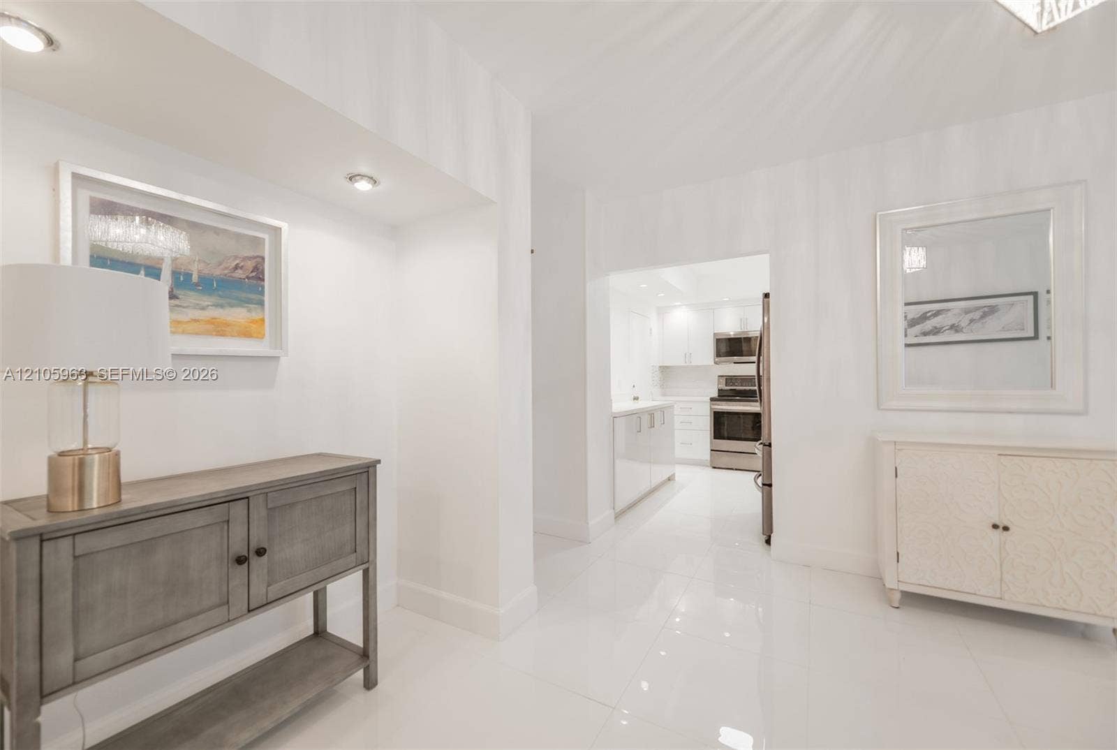 1980 S Ocean Drive, #PHA, Hallandale Beach, Hallandale Beach, FL 33009 Polished tile flooring, recessed ceiling lighting, and white wall finishes