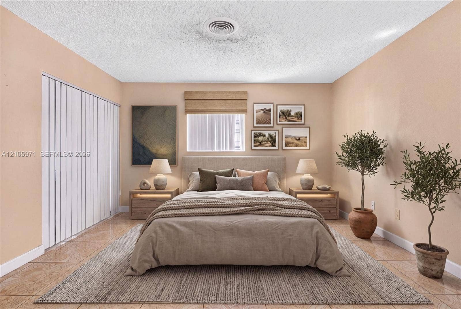 6604 Coconut Drive, Miramar, FL 33023 Neutral-toned interior featuring ceramic tile flooring, vertical window blinds, and a roman shade