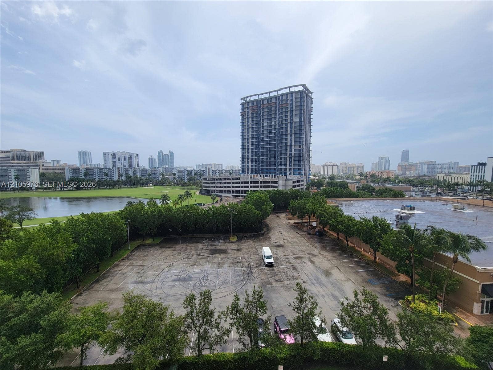 1755 E Hallandale Beach Boulevard, #704E, Hallandale Beach, Hallandale Beach, FL 33009 High-rise urban perspective featuring a panoramic cityscape, surrounding green space, and a large body of water