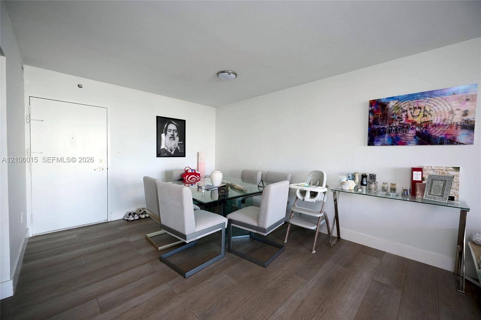 2851 NE 183rd Street, #1109E, Aventura, FL 33160 Interior space featuring wood-finish flooring, white walls, and a ceiling-mounted light fixture