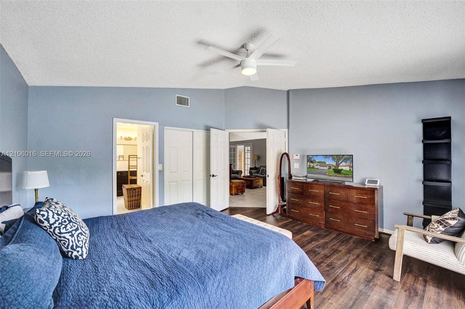 631 NW 135th Terrace, Plantation, FL 33325 Vaulted ceiling with integrated lighting, wood-finish flooring, and double-door entry
