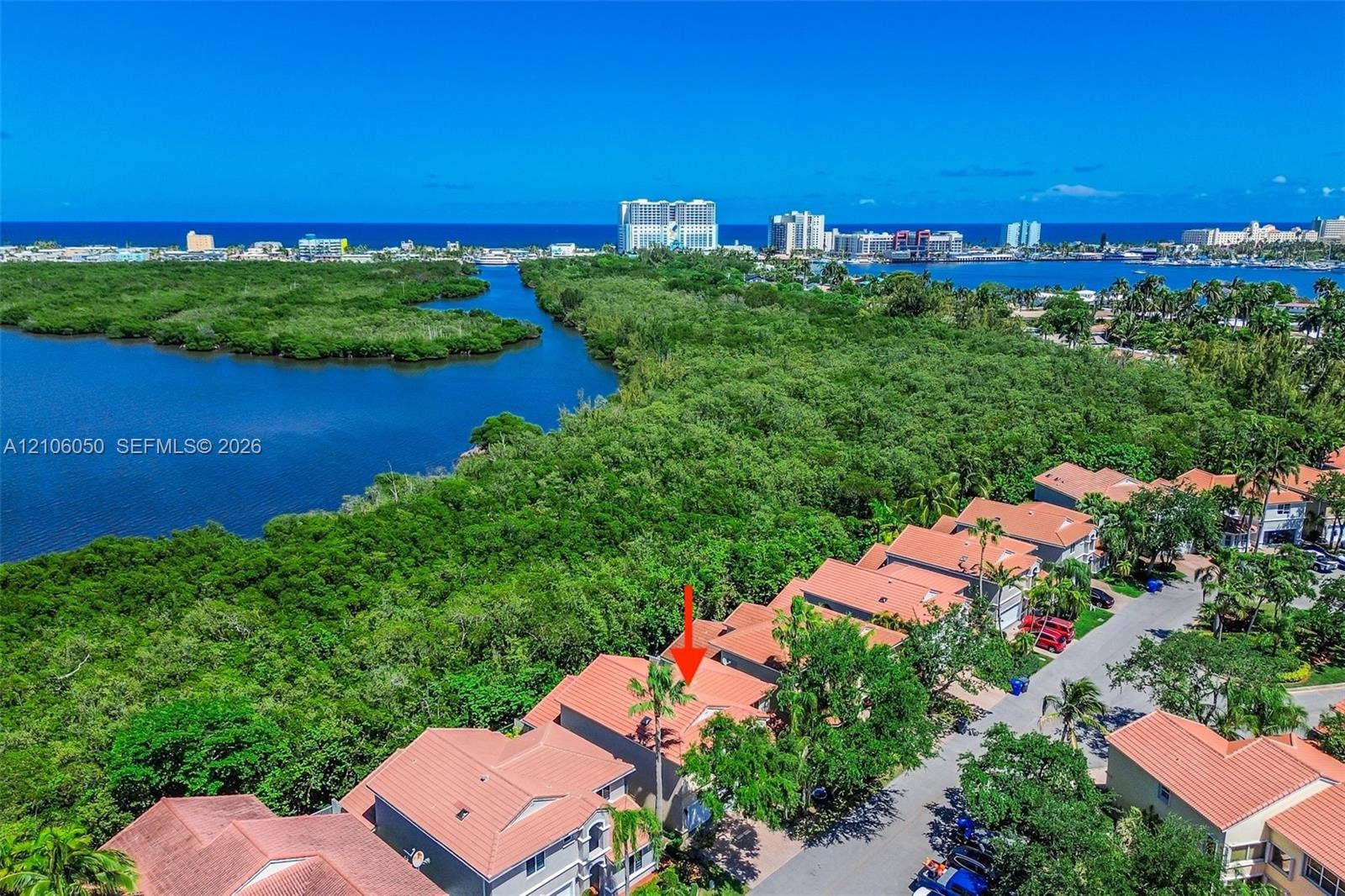 1065 Weeping Willow Way, #0, Hollywood, Hollywood, FL 33019 Aerial perspective featuring tile-roof residential construction and proximity to coastal waterways and dense natural vegetation