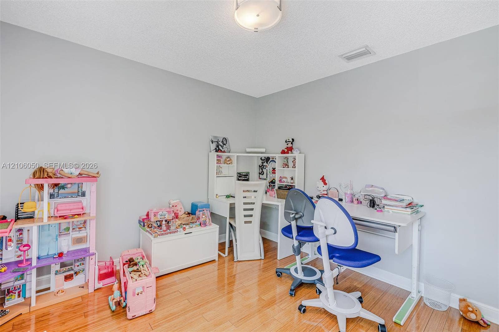 1065 Weeping Willow Way, #0, Hollywood, Hollywood, FL 33019 Room featuring wood-finish flooring and a central ceiling-mounted light fixture