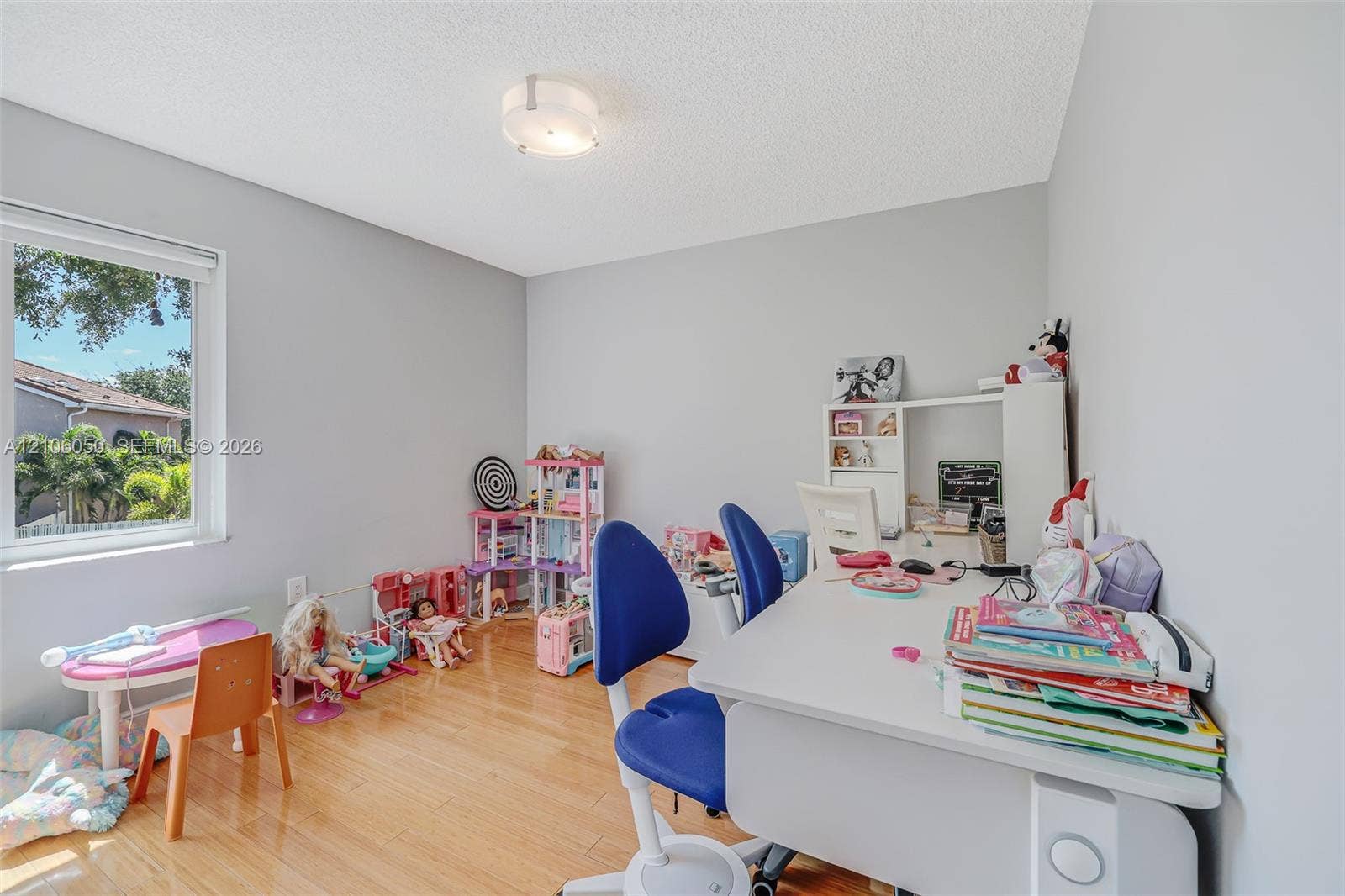 1065 Weeping Willow Way, #0, Hollywood, Hollywood, FL 33019 Room featuring wood-finish flooring, neutral wall paint, a single window, and a flush-mount ceiling light fixture