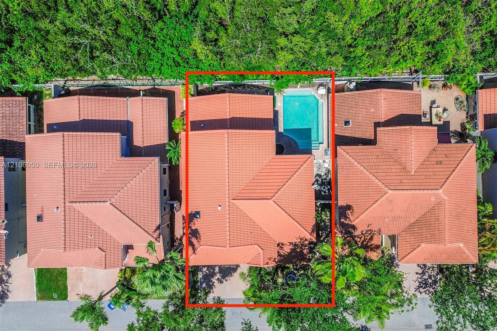 1065 Weeping Willow Way, #0, Hollywood, Hollywood, FL 33019 Aerial perspective of a multi-level residence featuring a clay tile roof and a private, in-ground swimming pool