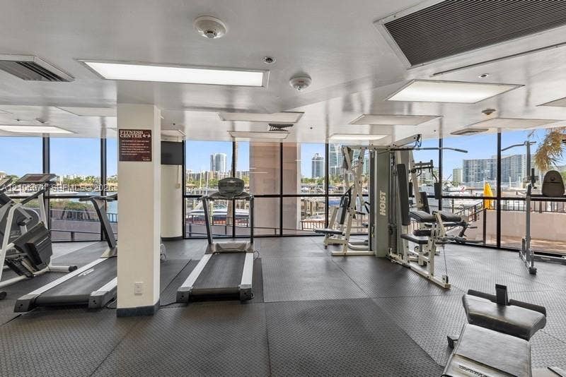300 Three Islands Boulevard, #308, Hallandale Beach, Hallandale Beach, FL 33009 Fitness facility featuring floor-to-ceiling windows, rubberized flooring, and recessed lighting