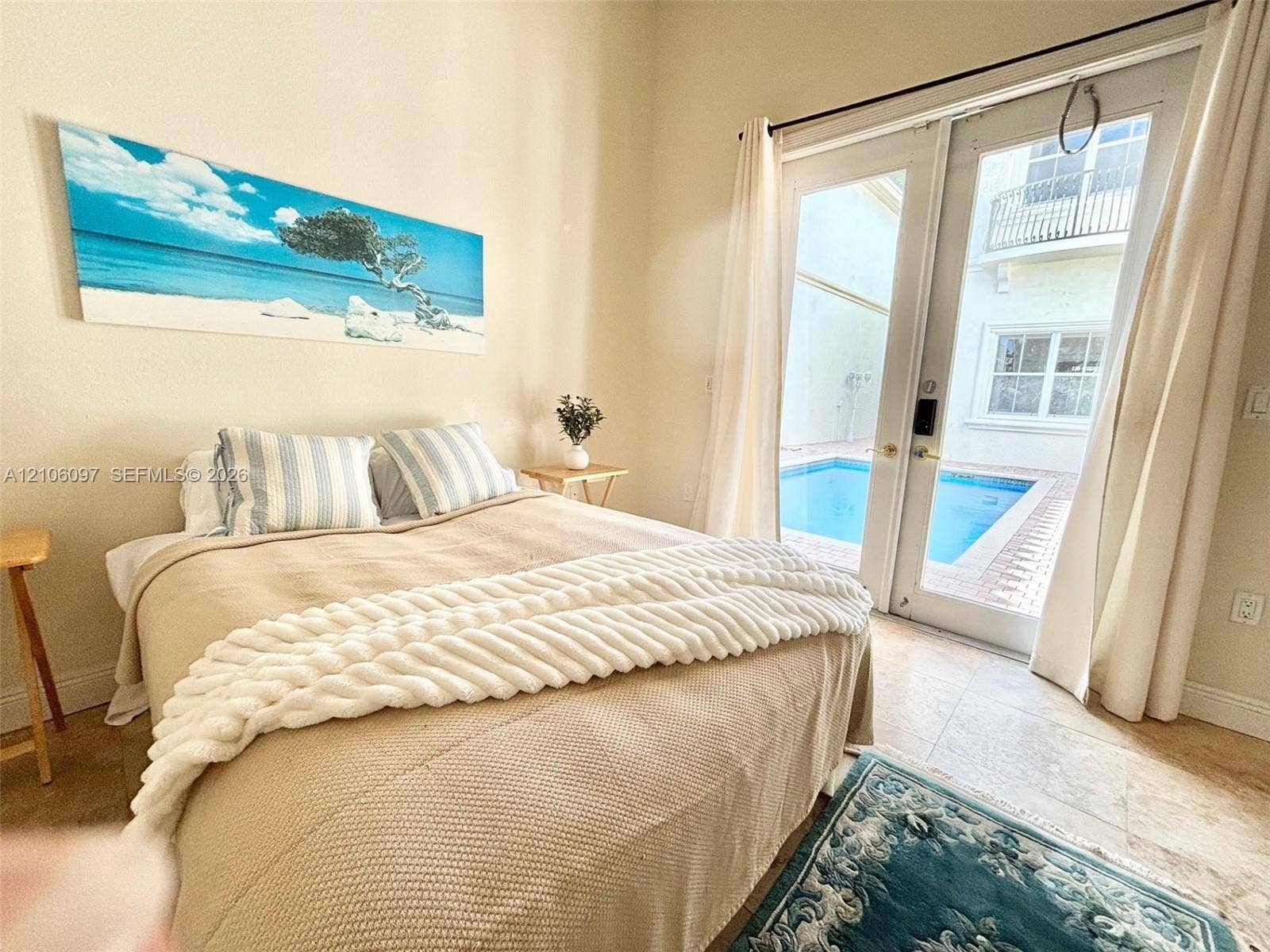 1141 Waterside Lane, Hollywood, FL 33019 Guest house bedroom overlooking the pool
