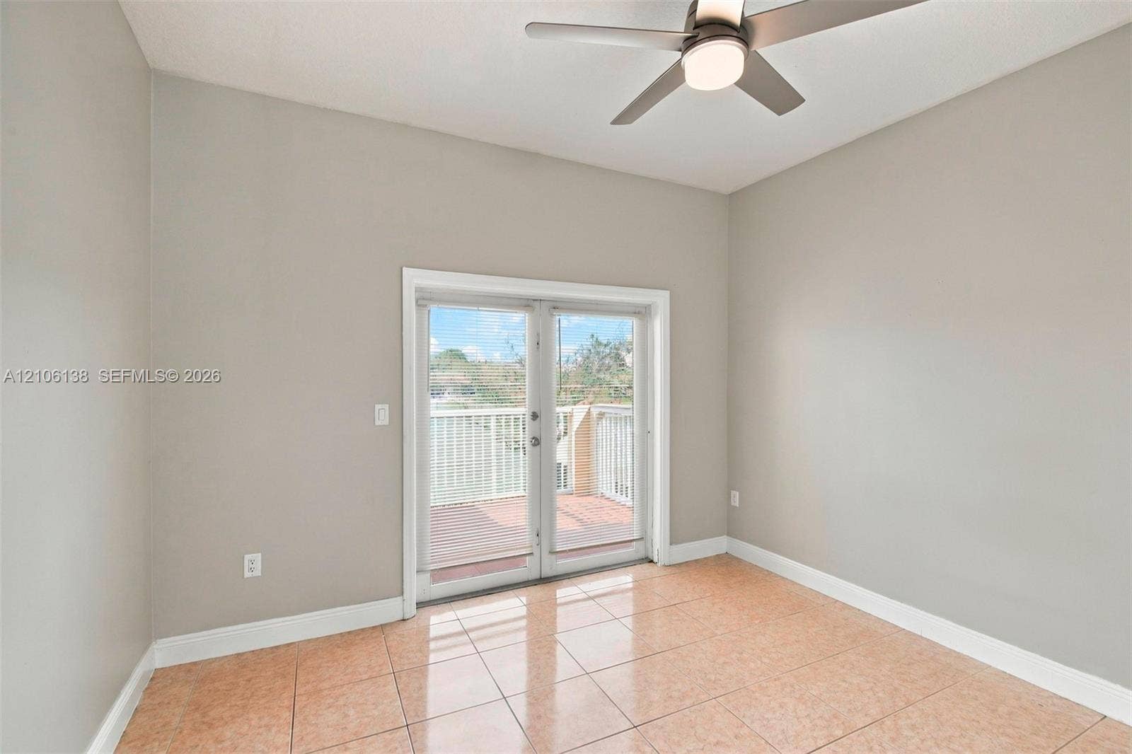 16119 SW 61st Lane, Miami, Miami, FL 33193 Room featuring neutral wall paint, tile flooring, and a ceiling fan with integrated lighting