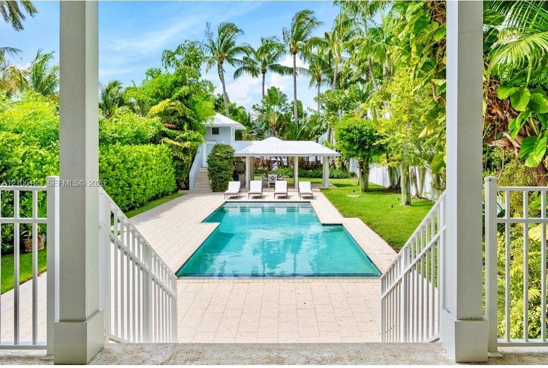 covered bbq area and pool bath