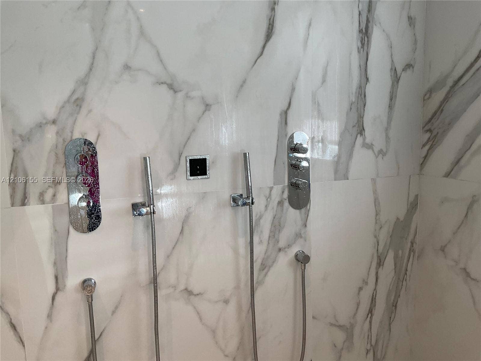 Primary bath shower with rain bath and steam