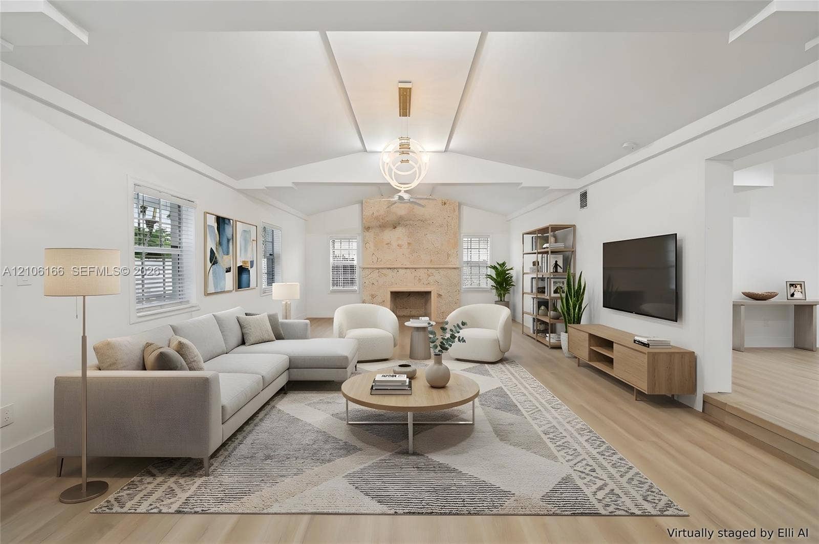 299 S Biscayne River Drive, Miami, FL 33169 Vaulted ceiling featuring recessed lighting, a stone-faced fireplace, and wood-finish flooring