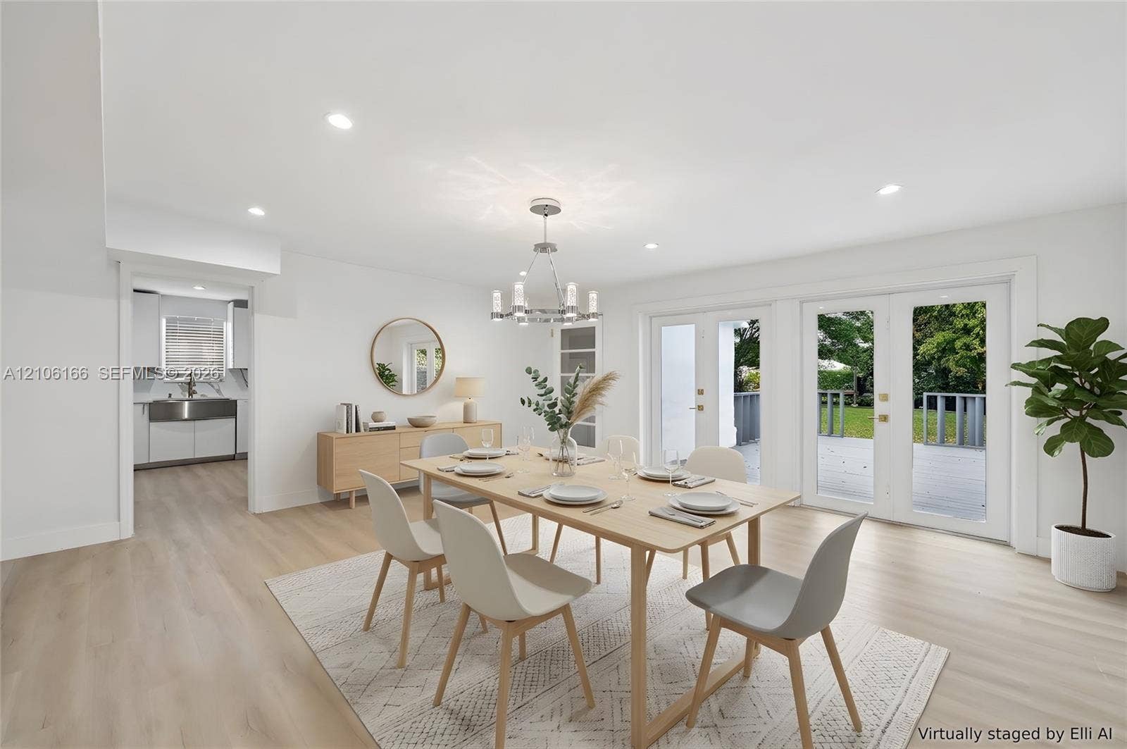 299 S Biscayne River Drive, Miami, FL 33169 Dining area featuring wood-finish flooring, recessed lighting, a modern multi-arm chandelier, and dual glass-paned doors with exterior access